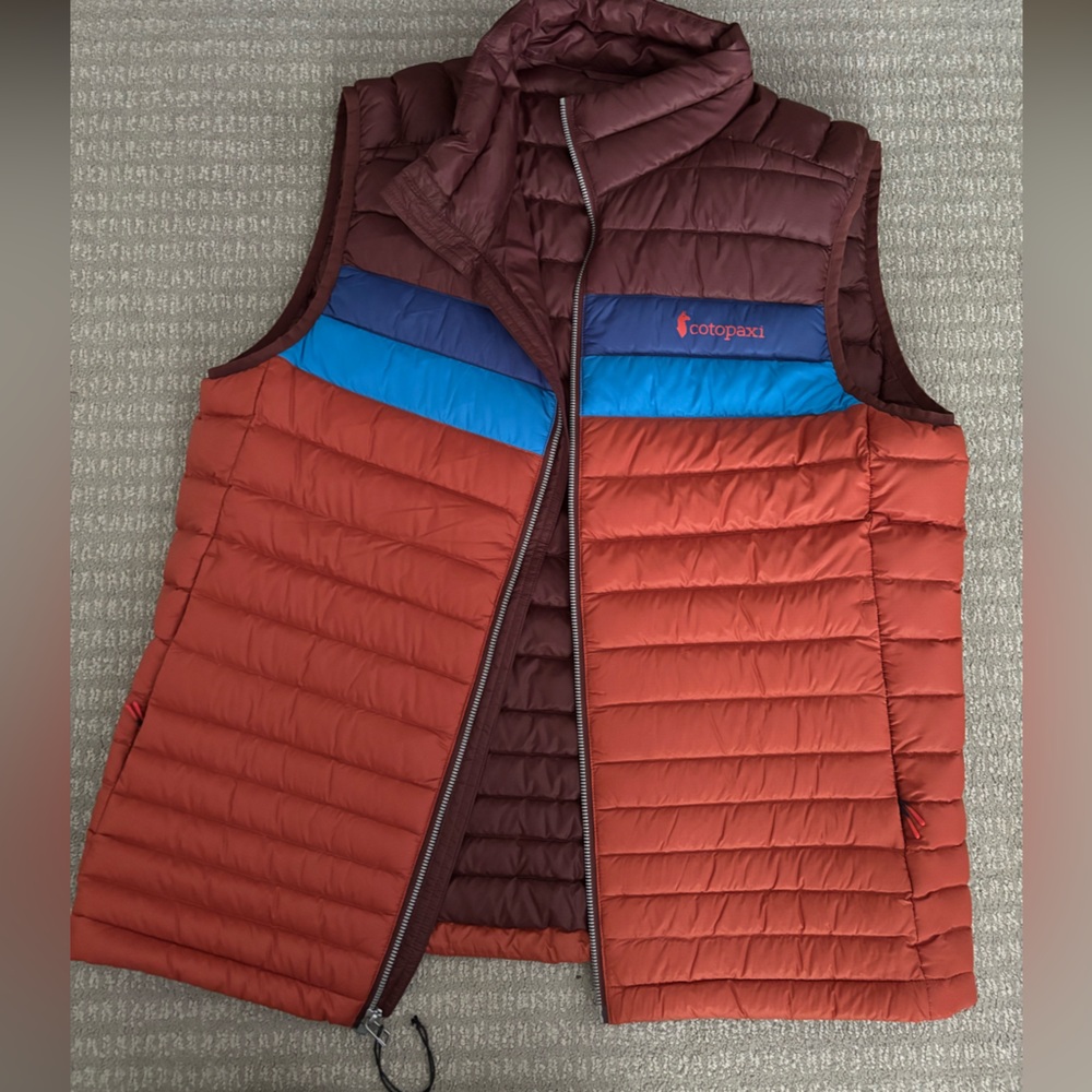 Men’s Cotopaxi vest, looks like Aviator Nation